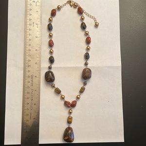 Necklace, wood grain shade of brown with gold accents